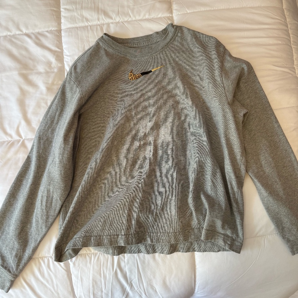 Nike Pullover with Cutesy Animal Print Logo on Chest